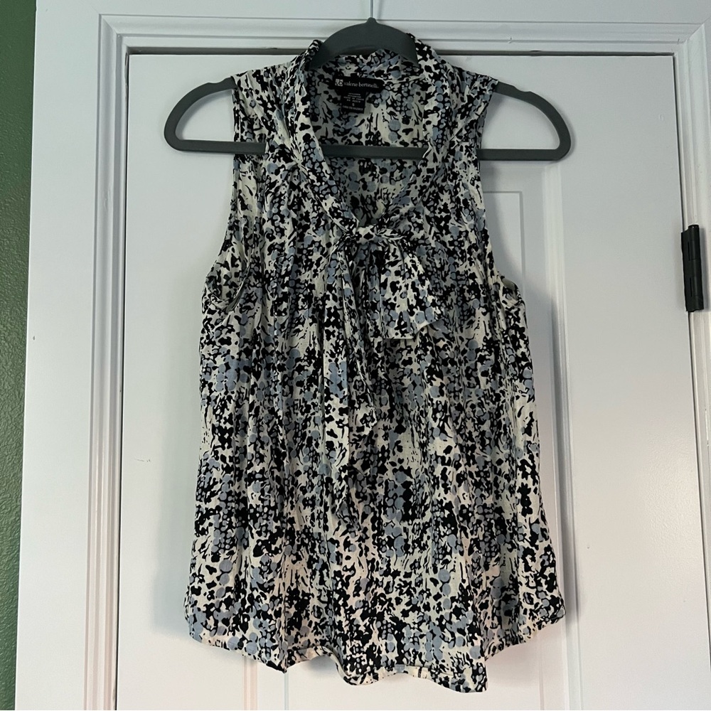 Valerie Bertinelli sleeveless blouse with tie neck